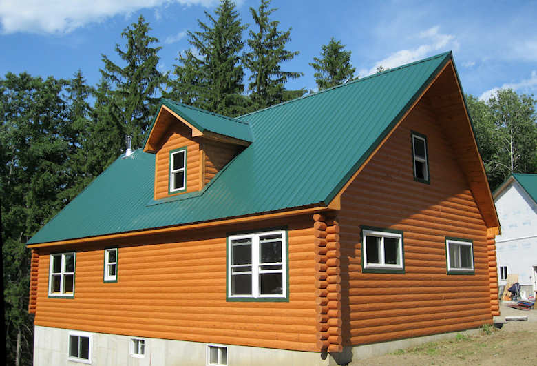 HEWN textured log siding home