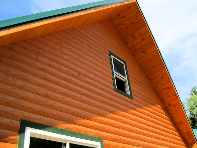 HEWN textured log siding home