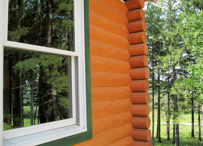 HEWN textured log siding home